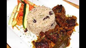 Any family meal for us is a production. Caribbean Brown Stew Chicken With Rice Peas Recipe Youtube