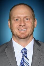 Rochester grad Adam Kiesler still defending 'coach of the year' title