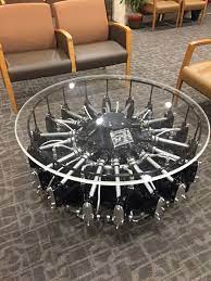 Actually it is a cylinder radial engine that represents the base of this coffee table which was used in wwii with a sheet of glass atop. Radial Engine Coffee Table Aviation Decor Aviation Furniture Engine Table