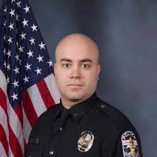 Louisville police want help finding suspect in cop shooting