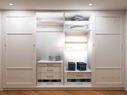 The existing wardrobes had three hanging doors which swing into the room. Made To Measure Sliding Door Wardrobe Kensington I Wardrobes London
