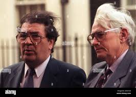 SDLP leader John Hume (left) and deputy Seamus Mallon speak to the press in  Downing Street after talks with Prime Minister John Major. Photo by Sean  Dempsey/PA Stock Photo