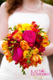 Bright Pink Yellow Orange Wedding Decorations Don T Like The Shade Of Orange But Love The Orange Wedding Decorations Spring Wedding Flowers Bright Wedding