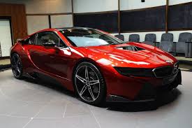The Spotlight Is Yours With This Custom Lava Red Bmw I8 This Hot Custom Lava Red Bmw I8 Is Available Only Through The Abu Dhabi Bmw Dealer Bmw I8 Bmw Red