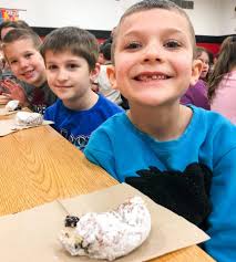 McKinley Elementary 1st graders received an awesome surprise delivery today  from The Chronicle-Telegram. Paczki time!