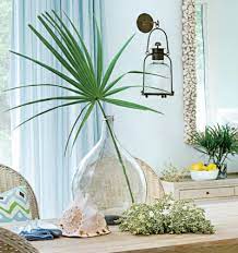 Bring them to your living room with this dried palm leaf arrangement. Palm Leaves Fronds For A Green Tropical Decor Touch Coastal Decor Ideas Interior Design Diy Shopping
