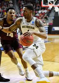 Michigan Wolverines Charles Matthews tostay in NBA draft
