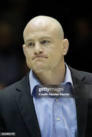 Scott Schiller of the Minnesota Golden Gophers and Morgan McIntosh of...  News Photo