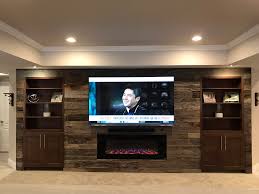 Elegant country entertainment center with recessed console and extended cabinets. Built In Wall Units Finished Basements Nj