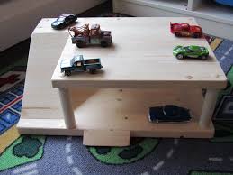 After a bit of research and a lot of thinking, i came up with this design. Wooden Toy Car Parking Garage Online