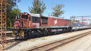 Transnet freight rail logo, cdr. Still Wearing The Spoornet Logo Transnet 34 825 Sits At Gweru Station Zimbabwe With Some 1 500 Tonnes Of Clinker Destined For Harare Trains