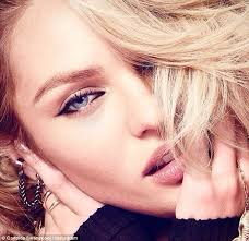 Candice Swanepoel is pretty in floral playsuit as she walks dogs with  boyfriend Hermann Nicoli