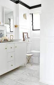 Besides adding black and white peel and stick floor tile, i also added crown molding and a beautiful olive green wall color called gaucho by valspar in eggshell. White Walls And Black Crown Moldings Transitional Bathroom