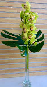 Send The Varden Cymbidium Orchids Bouquet Of Flowers From Orchids Little Secret Boutique In Pl Tropical Flower Arrangements Modern Orchids Arrangements Flowers