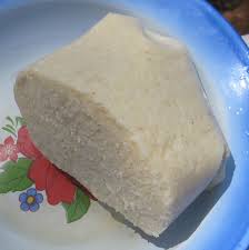 Prepare it like in the video below, make small lumps of it, dip in any nigerian soup and swallow. Garri Wikipedia