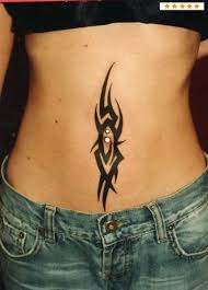 This tribal stomach tattoo design is trendy among the people, who are inspired by the tribal caste and tribal designs. Tribal Belly Button Tattoos Belly Button Tattoo Stomach Tattoos Women