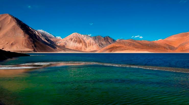 Pangong Tso's changing blue waters, AI generated