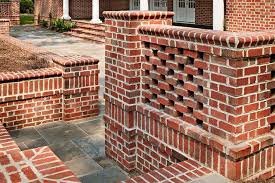 When Is A Wall More Than Just A Wall When It S Built With Brick This Perforated Brick Wall Features A Flemish Bond Brickwork Brick Architecture Brick Design