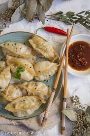 Garlic Chicken Spinach Dumplings Cooking With A Wallflower Recipe Easy Dumplings Recipe Chicken Dumplings Recipe Dumpling Filling