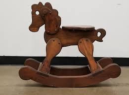 Wooden victorian child's rocking horse with glass eyes and red painted rocker base. Sold Price Vintage Wood Rocking Horse Dark Finish Heart Detail August 3 0120 6 30 Pm Edt