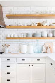 Open Kitchen Shelves Instead Of Cabinets Bright White Modern Kitchen With Open Wood Shelves And White Subway Til Home Kitchens Kitchen Interior Modern Kitchen
