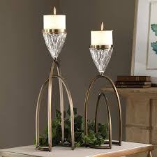 Create a glowing ambience and set the mood with unique candle holders. Carma Bronze And Clear Glass Pillar Candle Holder Set Of 2 58p99 Lamps Plus