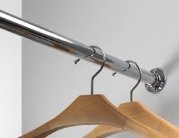 A curtain rail hung from the ceiling with some canvas fabric, and a few hooks and clothes hangers. Cabinet Rails And Cabinet Rail Supports Do It Yourself Hettich