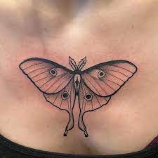 Luna moth thigh tattoo
