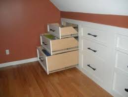 Perhaps a knee wall dresser is the answer! Goodshomedesign