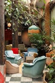 patio interior de la cafeteria le comptoir general en paris de estilo retro creative cafe interior cafe interior home decor furniture