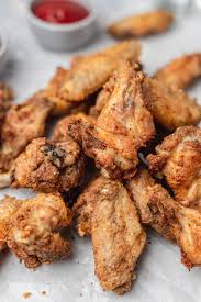 This recipe uses a little corn meal to help the chicken crisp during frying. Crispy Baked Chicken Wings Recipe Cravingsmallbites Com