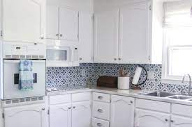With dish gloves on, use the hot water and the clean cloth to wipe the greasy cabinets. How To Touch Up Chipped Cabinet Paint Lovely Etc