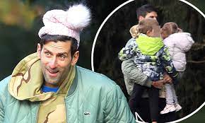 (photo by clive brunskill/getty images) getty images playing his first match at wimbledon in 700 days, novak djokovic slipped on the grass a couple of times but ultimately cruised to victory. Novak Djokovic Puts On Playful Display As He Dons Daughter S Pink Bobble Hat During Family Outing Daily Mail Online