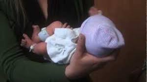 Slide your hand up from baby's bottom to support their neck. How To Hold A Newborn Basic Holds Youtube