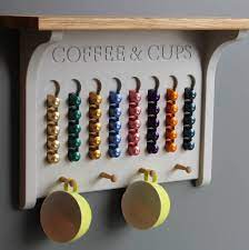 The machine can process and pierce the capsule independently. Wall Mounted Coffee Pod Holder A Choice Of Colours By Chatsworth Cabinets Notonthehighstreet Com