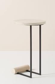 A coffee table, side table, or accent table is always there when you need a convenient place to set your drink or display decor. Horizon Black Iron Stone Side Table