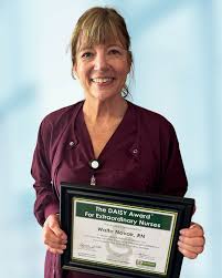 Congratulations to Walta Novak for her second DAISY award! Walta has had  numerous DAISY award nominations! Walta was recognized for the second time  as a DAISY Award recipient. Novak, an RN in