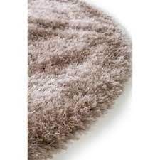 This rug has a medium 0.5 pile height, so it's ideal for placing in rooms with low or high foot traffic like the bedroom, living room, or home office. Benuta Essentials Shaggy Carpet Swirls Pink O 200 Cm Round Long Pile Carpet For Living Room Living Room Carpet Shaggy Rug Shag Carpet