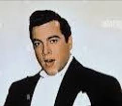 Who is the singer in the 1945 photo with sax player at The Blue Room?