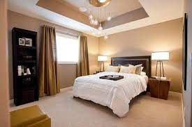 Glamorous Lighting Ideas That Turn Tray Ceilings Into Architectural Masterpieces Bedroom Design Ceiling Design Bedroom House Interior