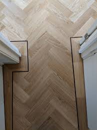Oak Parquet Wood Flooring With A Single Border And A Single Tramline In A Darker Wenge Timber Stairs Cladding Wood Floor Design Living Room Wood Floor