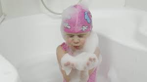 While drinking bath water probably won't put your child in any serious danger, it is still not an ideal habit. Child Taking Bubble Bath Stock Video Footage 4k And Hd Video Clips Shutterstock