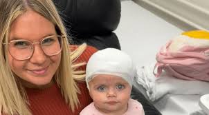 The mysterious case of the mumfluencer accused of 'faking her baby's brain  tumours' to rake in cash, sympathy and likes