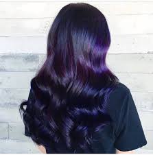 This dark purple hair is cool and fit for both the office and the outdoors. Deep Purple Balayage