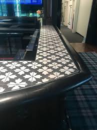 The underside of the breaker bar may also be rubberized to prevent it from marking the tiles. Bar Top Devoe Construction Design