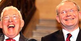 A laugh and a look into the future as old foes join forces at last to share  power at Stormont