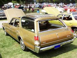 1969 oldsmobile vista cruiser wagon with 14 inch wire wheel covers classic cars today online 1969 oldsmobile vista cruiser wagon