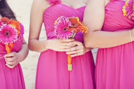 Be a blushing bride with a bouquet bursting with colour. Bright Gerbera Daisy Bridesmaid Bouquets Bright Bridesmaids Dresses