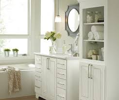 Think of humble bathroom cabinets as magic makers. White Bathroom Cabinets Kemper Cabinetry