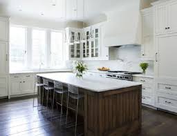 Rustic kitchens might be the most fun to design because you can get away with all kinds of cabinets. I Like The Mix Of Plain And Rustic For This Island I D Like It Better If It Were Higher On The Side Kitchen Inspirations Brown Kitchens White Kitchen Cabinets